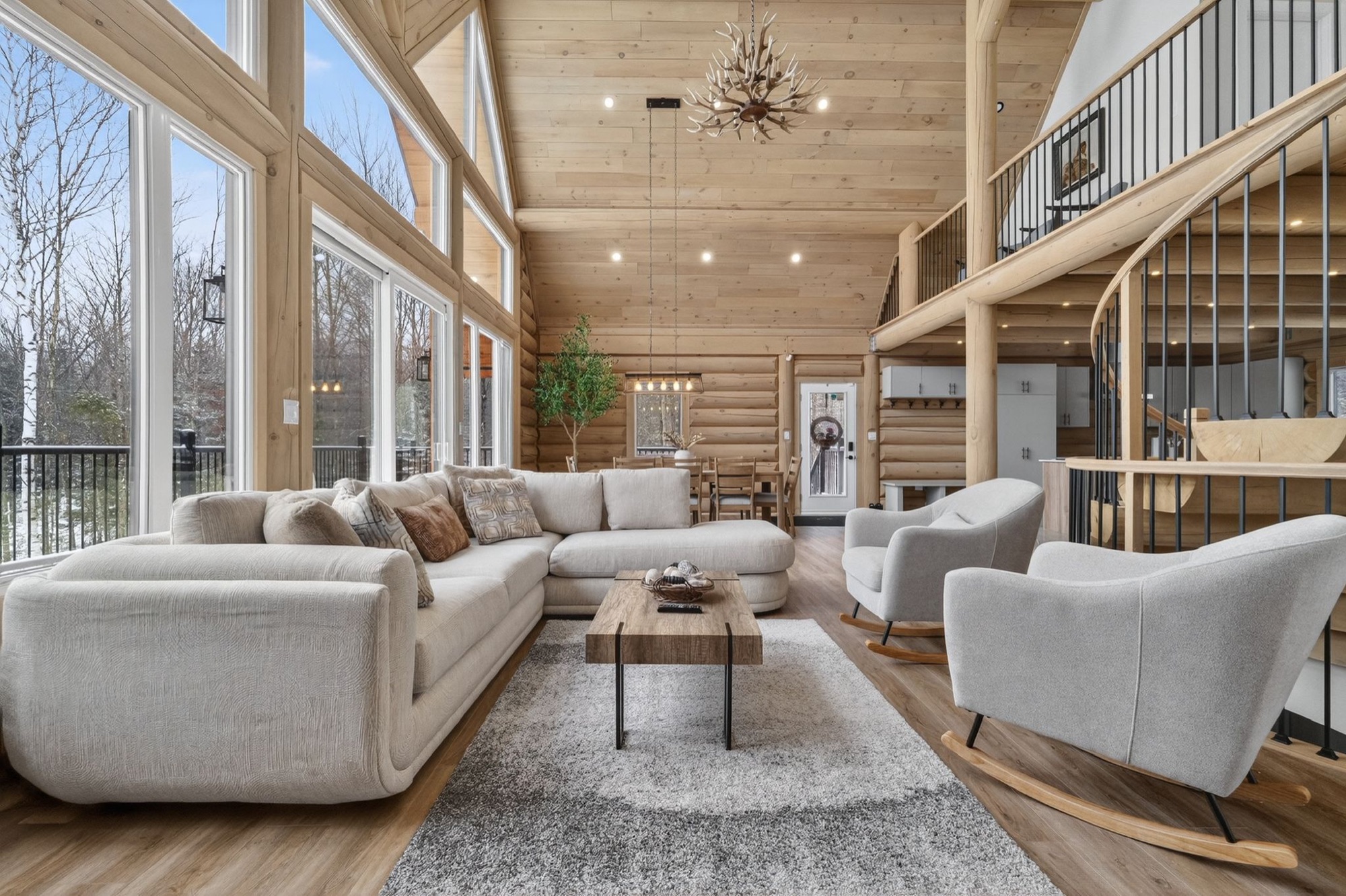 Bright living room with floor-to-ceiling windows