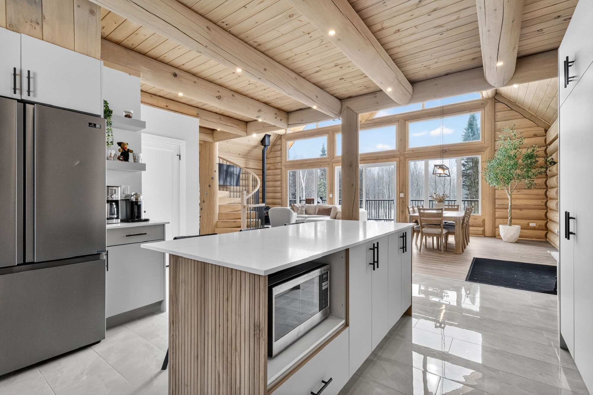 Modern kitchen with wood beams and large island
